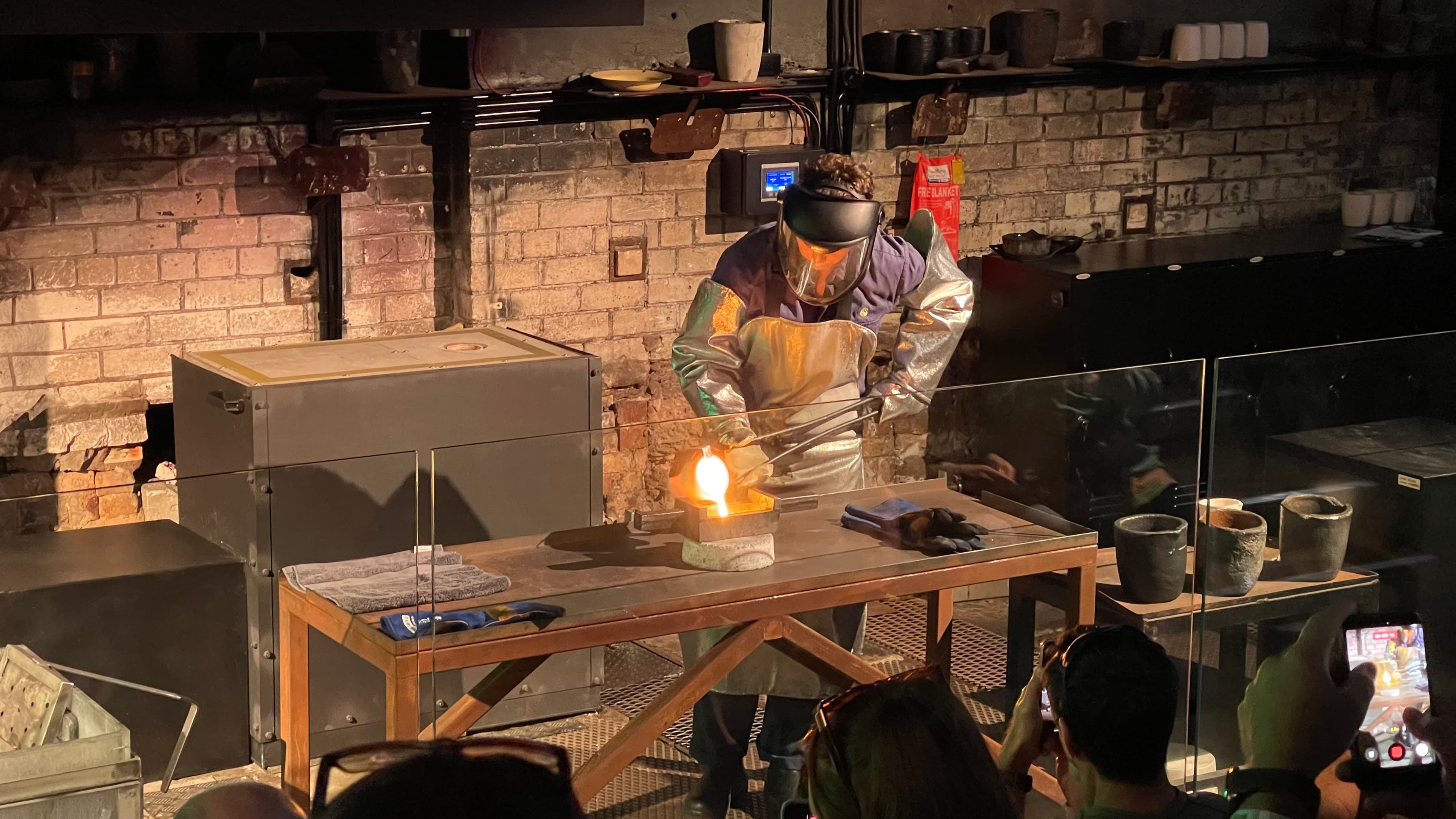 Molten gold being poured into an ingot mould during a pour at the Perth Mint foundry